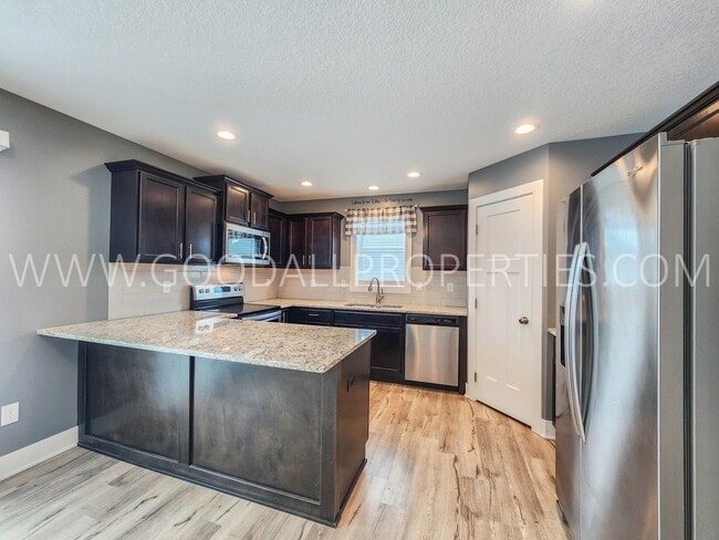 Building Photo - A Must See 4 Bedroom 3.5 Baths in Norwalk with a 3 Car Garage!!!