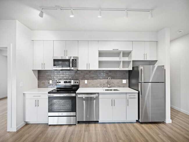 Building Photo - Flats on 4th Apartments