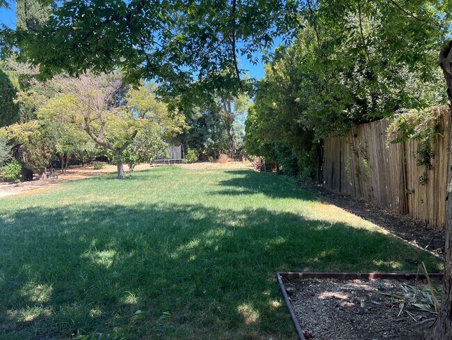 Building Photo - Experience Tranquil Living on Nearly Half ...