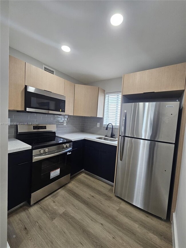 Building Photo - 560 NE 63rd St