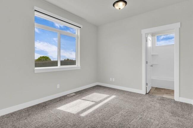 Building Photo - New 2024 Townhome with Office & 2 Car Garage