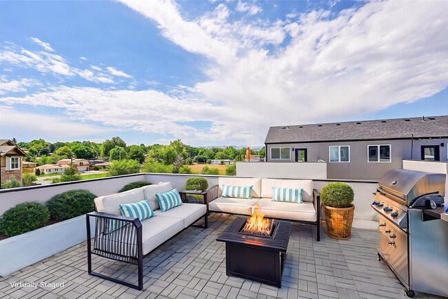 Building Photo - New Construction 3-Bedroom Townhome with Rooftop Deck & Mountain Views