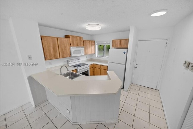 Building Photo - 8750 N Sherman Cir