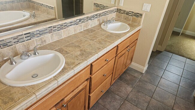 Building Photo - Four Bedroom Home Available!