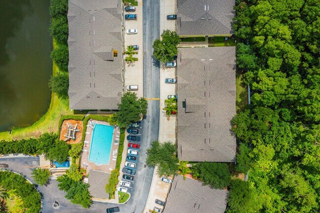 Building Photo - Heron's Landing End Unit Overlooking the Sparkling Community Pool