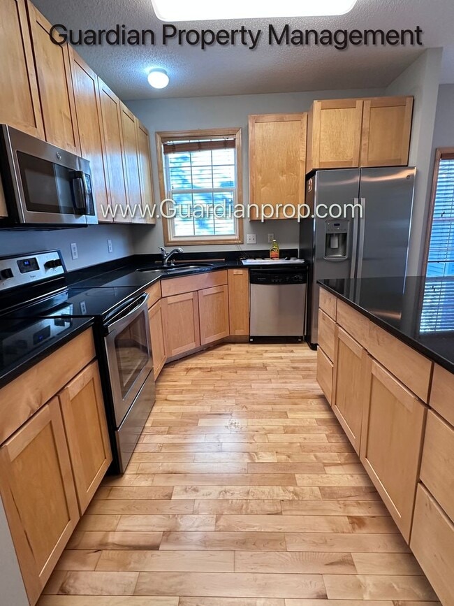 Building Photo - Hopkins Single Family Home, 2 Car Garage, Office, Gas Fireplace, Primary Suite