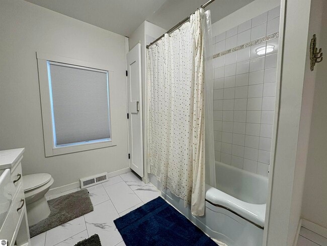 Building Photo - 7638 Skegemog Point Rd