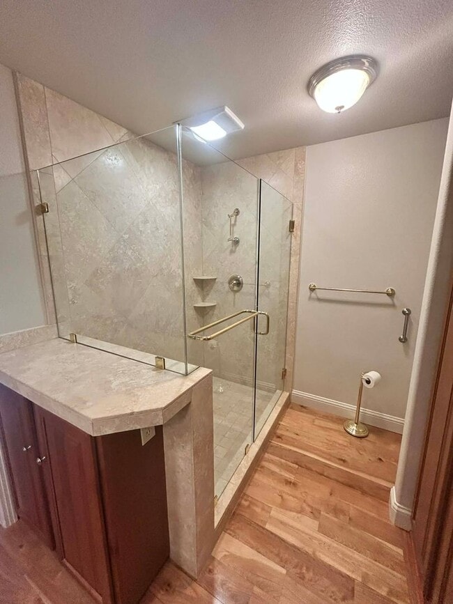 Building Photo - Spacious Duplex with 3-Car Garage & Private Patio!