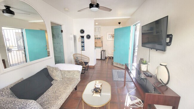 Building Photo - Charming, Fully Furnished Spanish-Style Du...