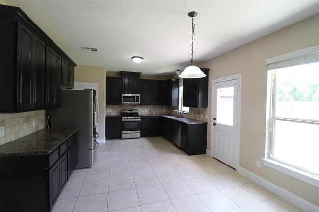 Building Photo - 8411 Creekside Timbers Dr