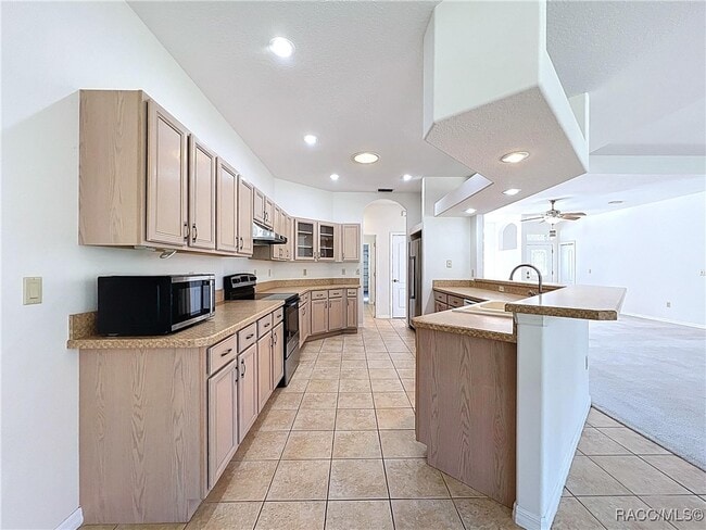 Building Photo - 5950 N Petunia Terrace