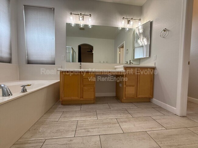 Building Photo - 8278 W Charter Oak Rd