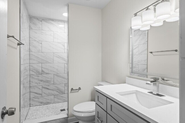 Building Photo - "Charming 2-Bedroom Townhouse Retreat with...