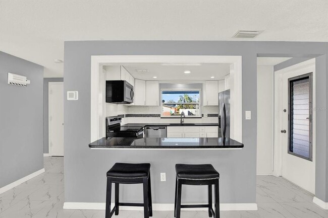 Building Photo - 7902 Canna Dr