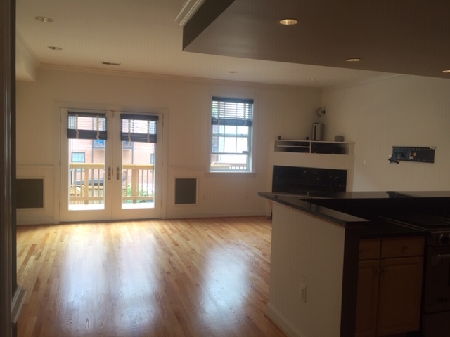 Family Room with French Doors to Full Deck - 1619 12th St NW