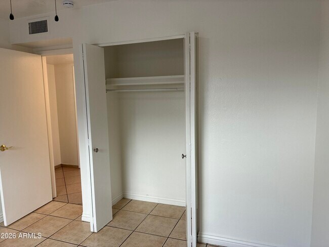 Building Photo - 8819 W Roma Ave