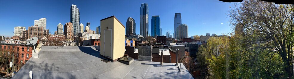 view from roof of downtown Manhattan & Freedom Tower - 143 Sussex St