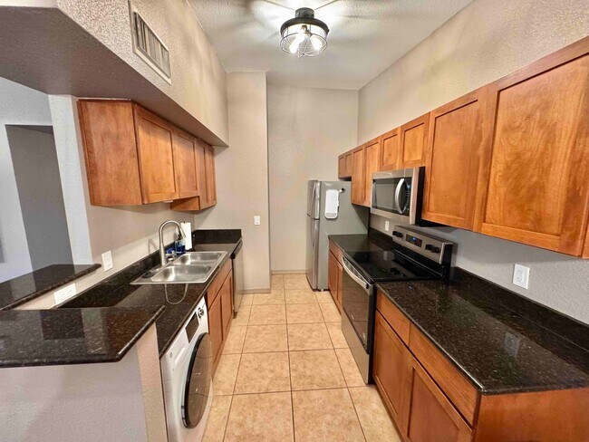 Building Photo - Furnished Moved In Ready 2nd Story End Unit 1bd/!ba At the Arbors