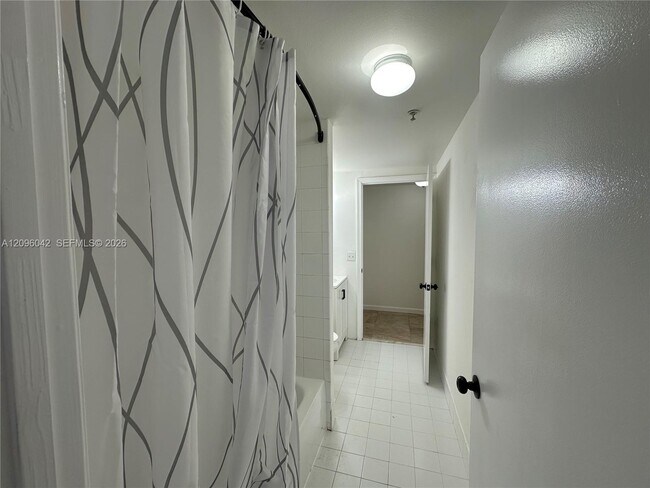 Building Photo - 3241 Sabal Palm Manor