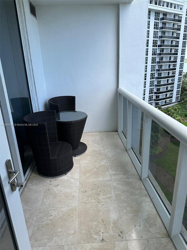 Building Photo - 10275 Collins Ave