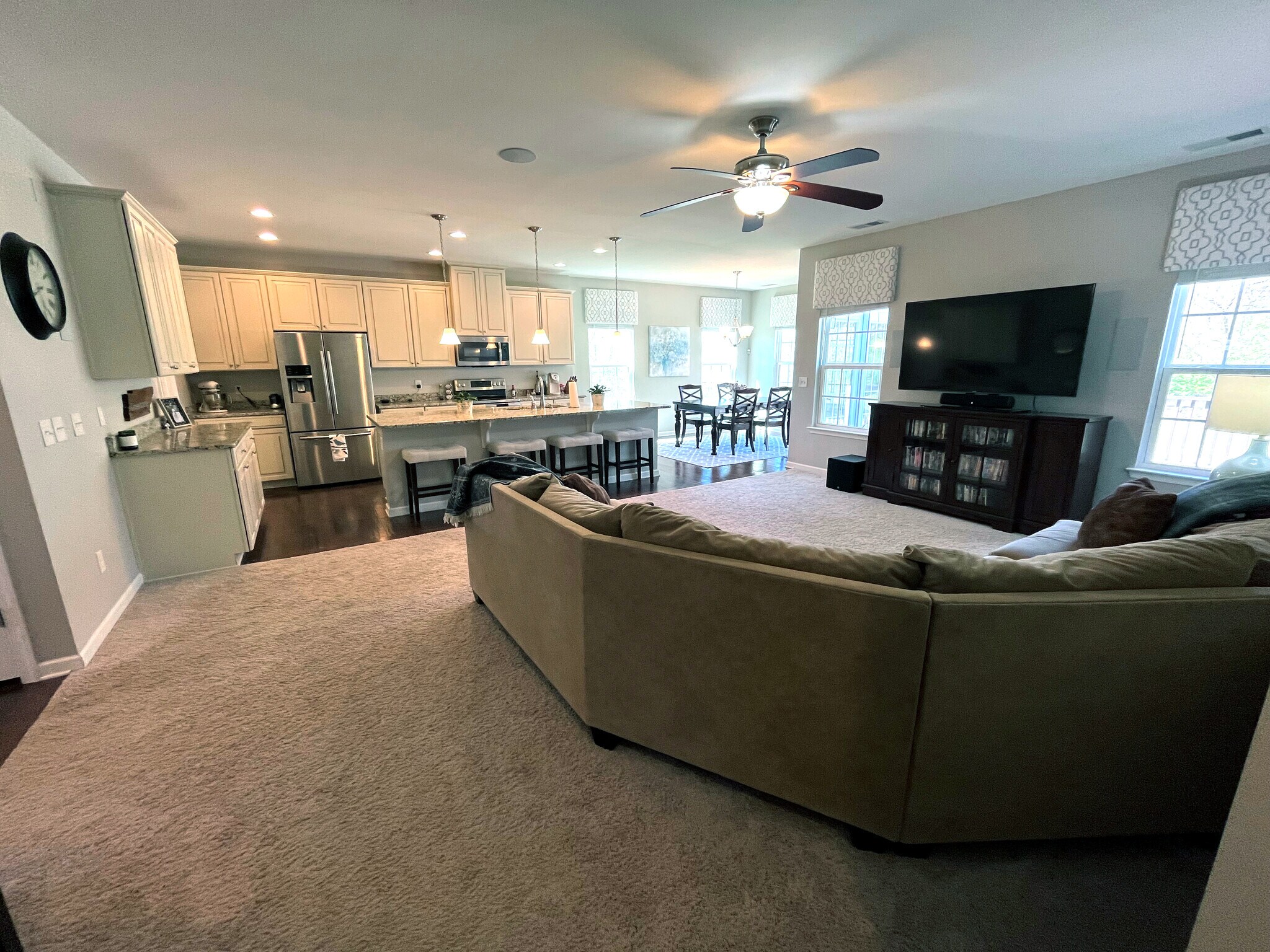 Looking from the master bedroom to the open great room, kitchen, dining room - 7736 Tranquil Trl