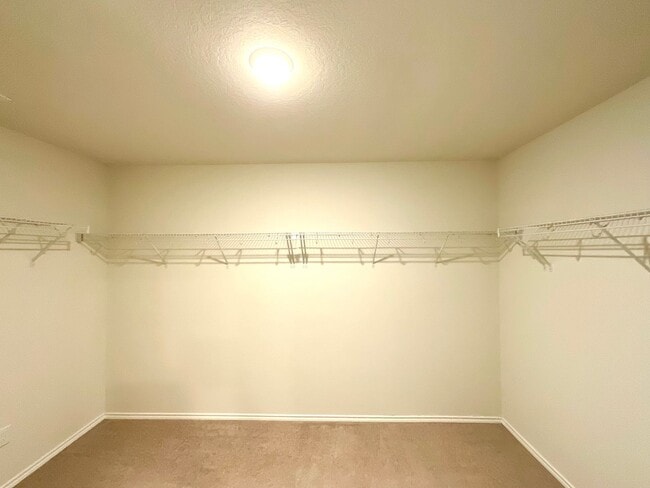 Building Photo - AVAILABLE NOW- Energy-Efficient 4/3 Home with Solar Panels & Pool Access!