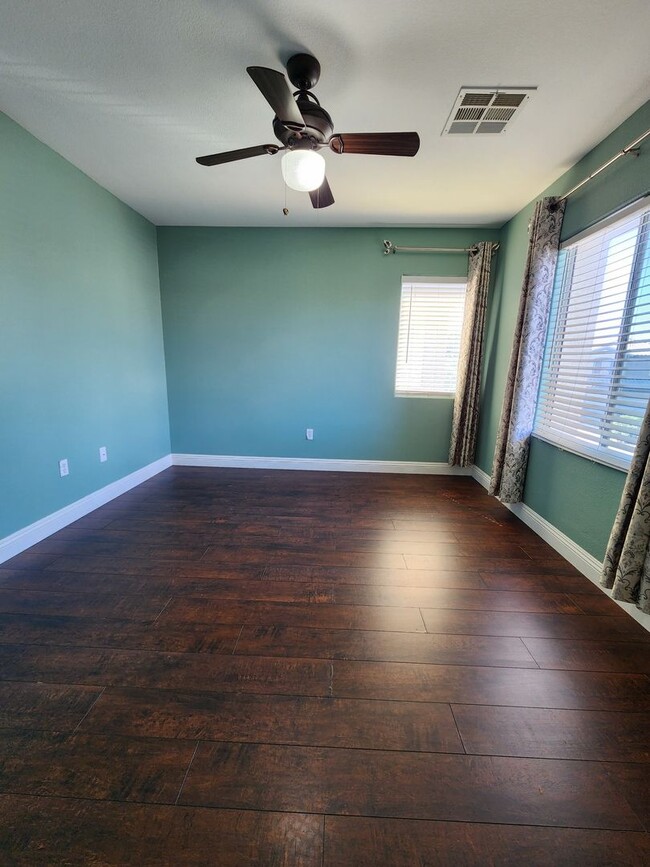 Building Photo - Rhodes Ranch 4 Bed Home | Guard-Gated Community | Trash & Sewer Included