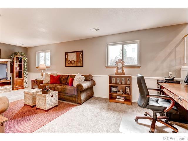 large sunken family room with plenty of light. not shown is a half bath room, laundry facility and attached garage access - 7091 Beech Street