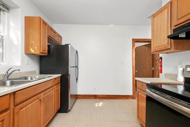 Building Photo - 6540 S Vernon Ave