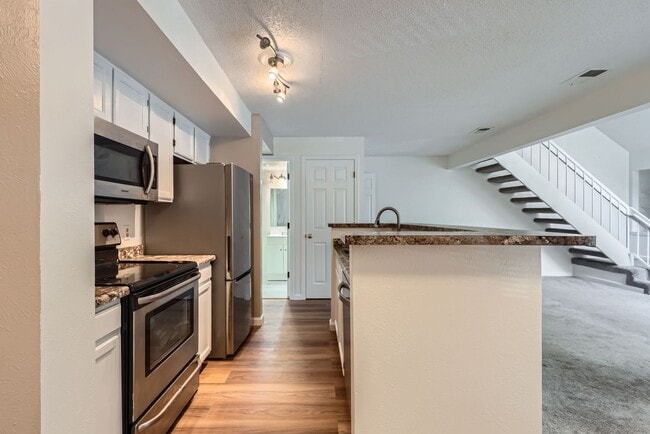 Building Photo - MOVE-IN SPECIAL ($250): Spacious Condo wit...
