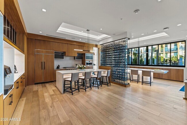 Building Photo - 6587 N Palmeraie Blvd