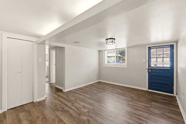 Building Photo - FIRST MONTH FREE! Renovated studio with garage + utilities included! Modern kitchen with island, ...