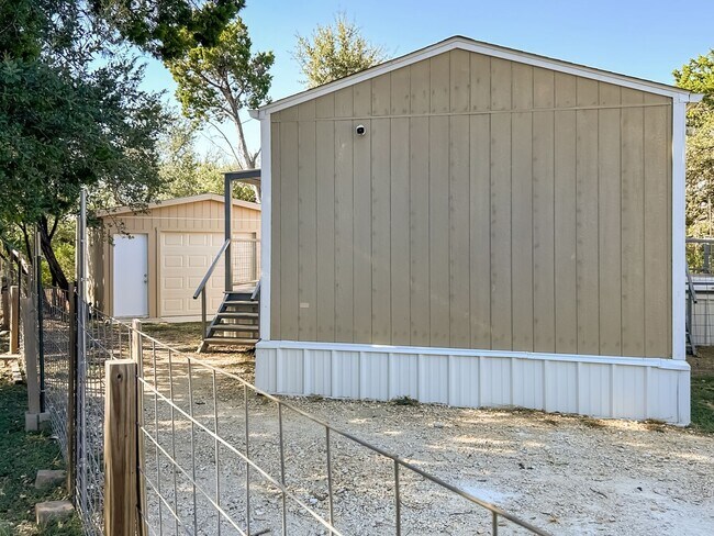 Building Photo - Move-In Ready Home Near Canyon Lake – Fresh Interior, Deck & Detached Garage