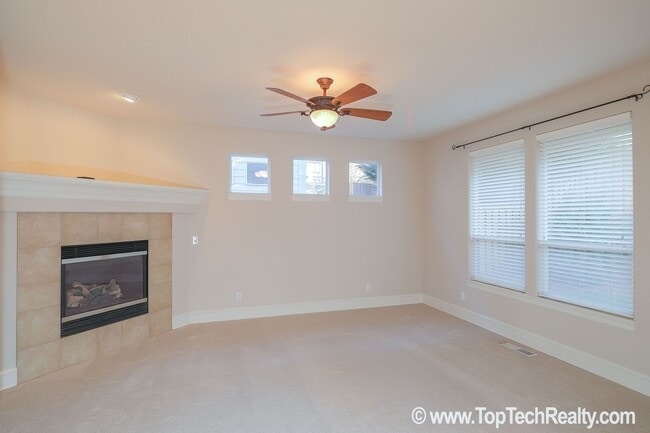 Building Photo - Amazing 3 Bed + Office/Den + Bonus/Media Room | Exclusive Bauer Highlands Community | Fenced Back...