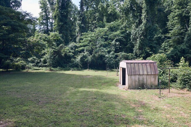 Building Photo - Vintage Charm with Modern Upgrades and Sunroom Living