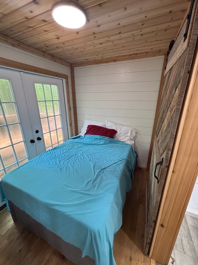 Building Photo - Cozy, Modern Tiny Home with Wrap-Around Po...
