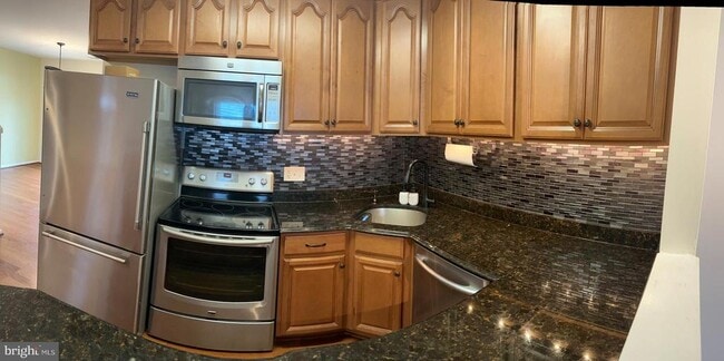 Building Photo - 7943 Timarand Ct