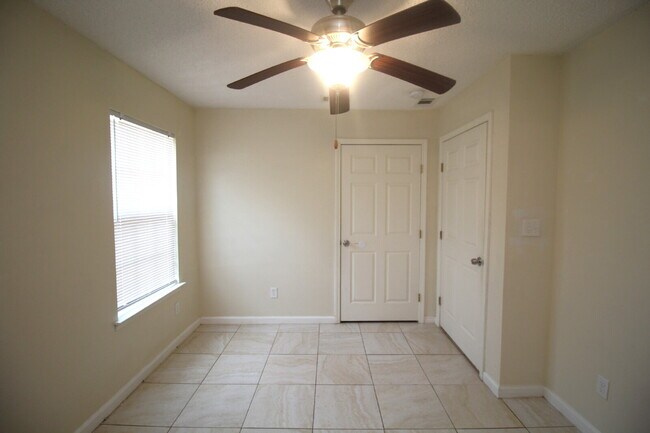Building Photo - West Pensacola Duplex Living — 3BR Home with Open Floor Plan, Eat-In Kitchen, Covered Patio & Low...