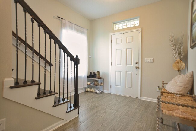 Building Photo - Beautiful Pond-Front Home Near Amelia Concourse