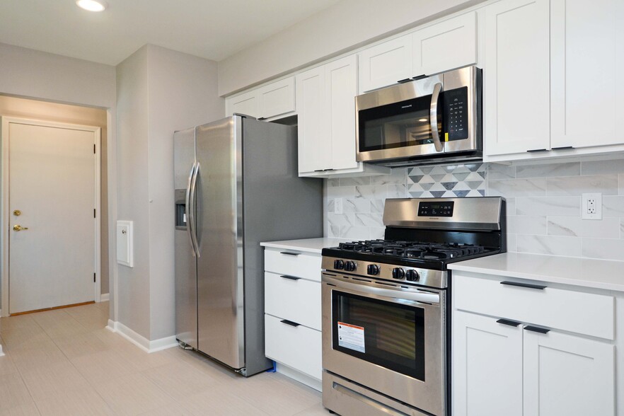 New, matching stainless steel appliances - 5206 Grandview Ln