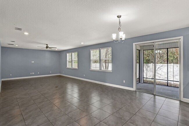 Building Photo - Beautiful 5/4 Home with Over 4k sqft, Fenced in Yard & 3 Car Garage! Pet friendly!