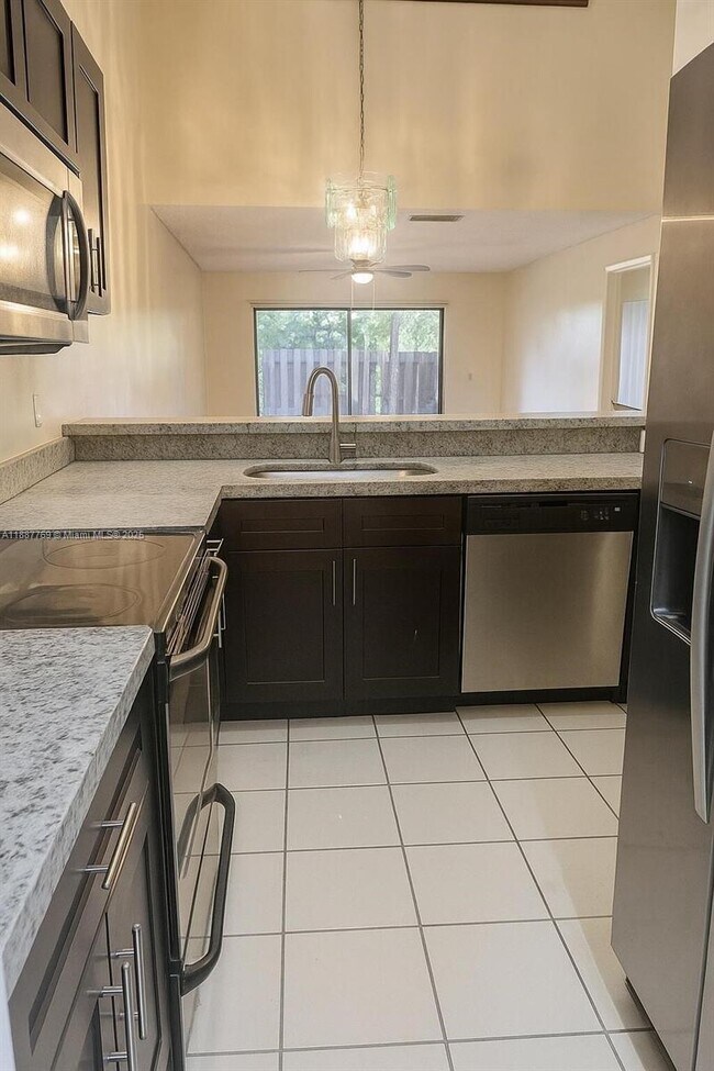Building Photo - 6822 SW 39th St, 14G