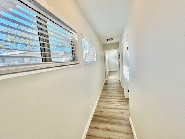 Hallway leading to bedrooms and bath - 1327 La Palma St