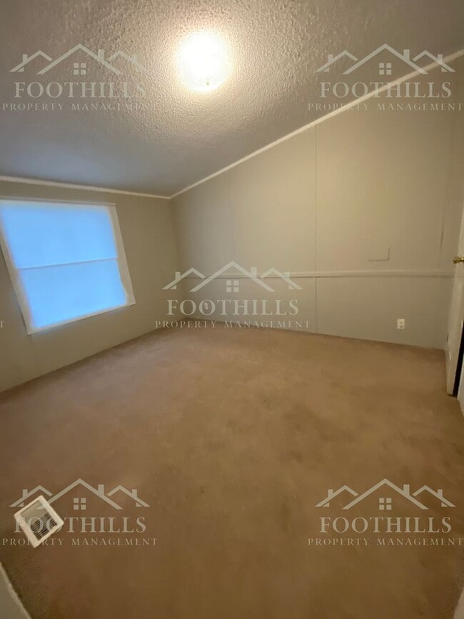 Building Photo - Peaceful Pondside Living – 3BR/2BA Home wi...