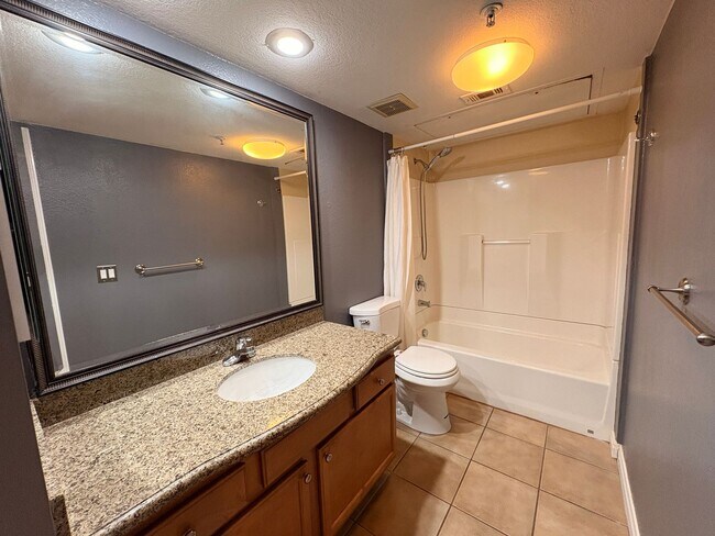 Building Photo - 1BR Condo with Private Balcony, Central A/C & Community Amenities in Corona