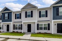 Building Photo - Open-Concept 3BED 2.5 BATH Townhome with Lawn Care Included!