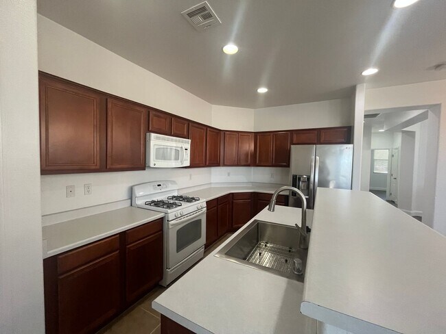 Building Photo - Stylish single-story living with 3 bedrooms, 2 baths, plus a versatile den — 1,489 sq ft of comfo...
