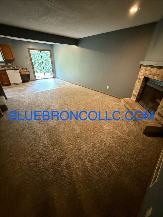 Building Photo - New flooring and fresh paint in this spaci...