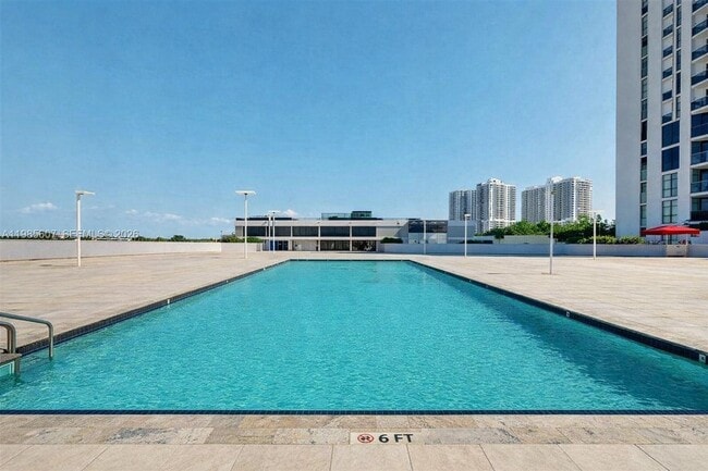 Building Photo - 3675 N Country Club Dr