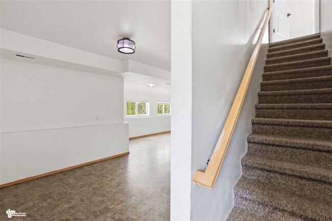 Building Photo - Luxury Alaska Living with Room to Spread Out — Mountain Views, Massive Garage & Incredible Commut...